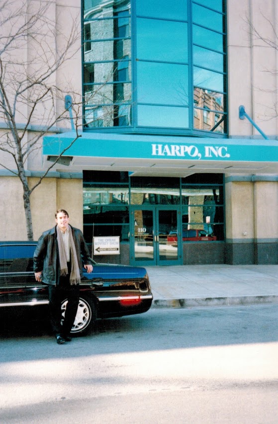 Jorge Cruise outside Harpo, Inc. in Chicago beside the limousine sent for his 1998 Oprah Winfrey Show taping