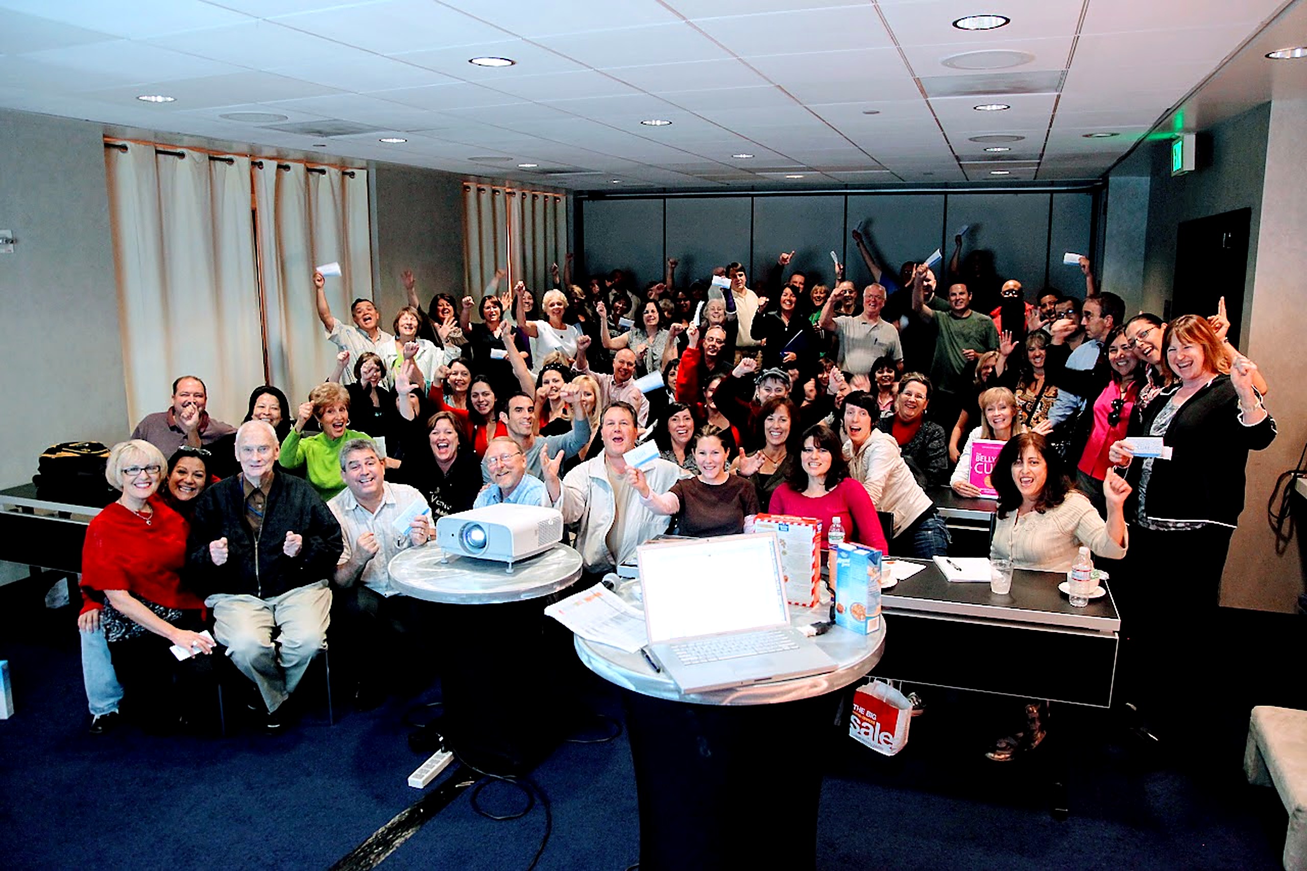 The San Diego Belly Fat Cure challenge group celebrating their results with Jorge Cruise