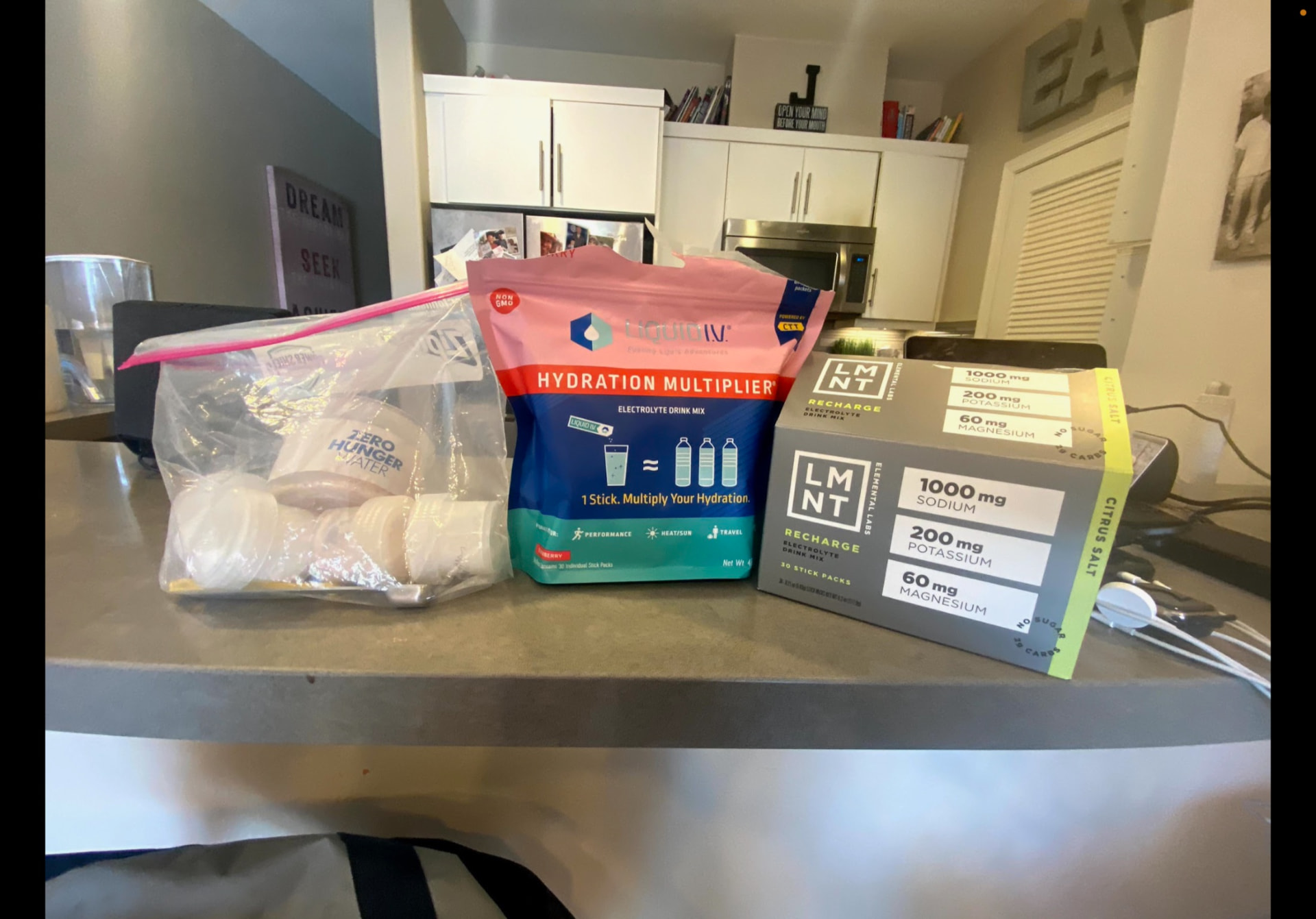 Early Zero Hunger Water ingredients and mixing containers on Jorge Cruise's kitchen counter in 2021