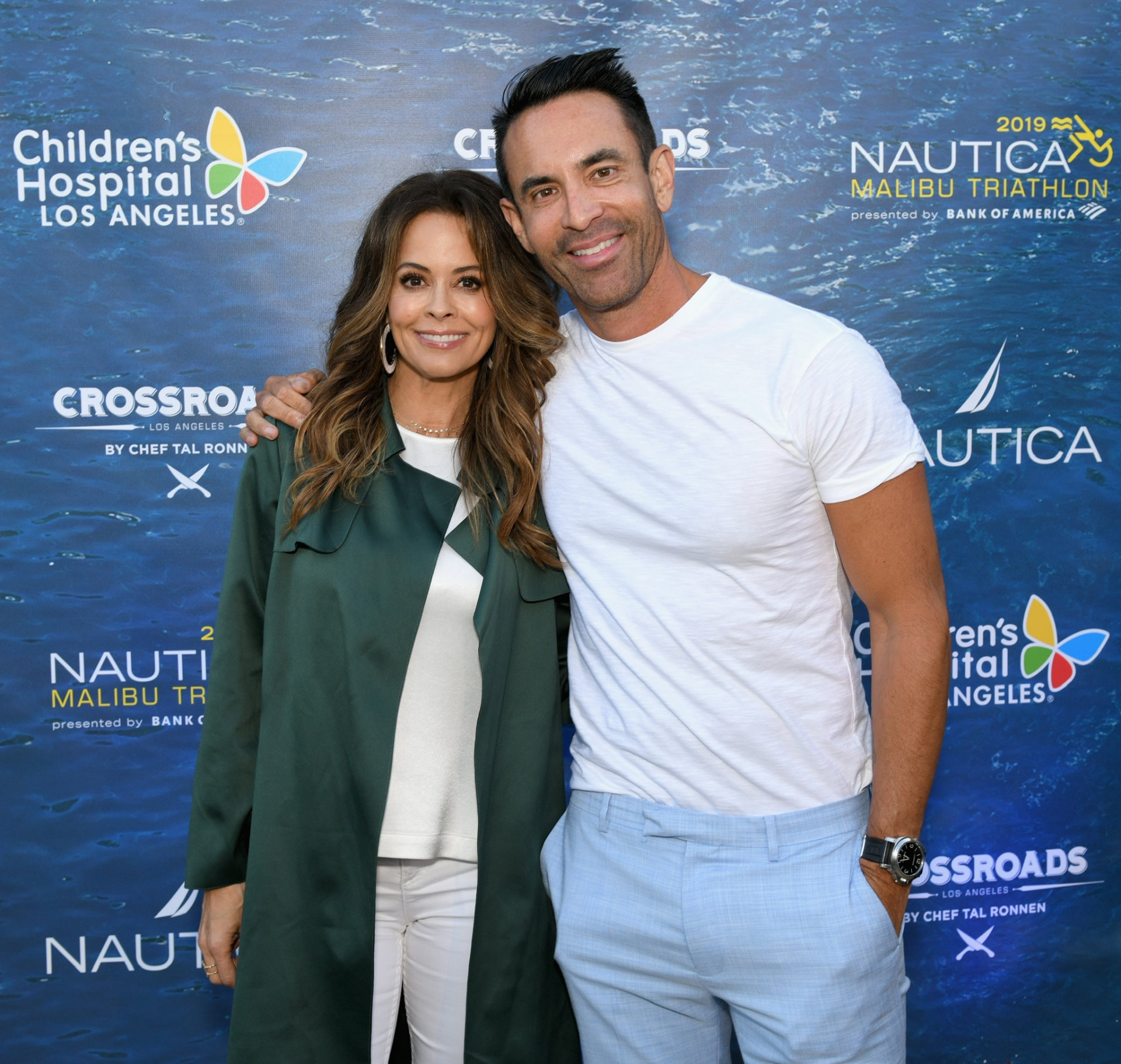 Jorge Cruise and Brooke Burke on the red carpet at a children's charity benefit in Los Angeles